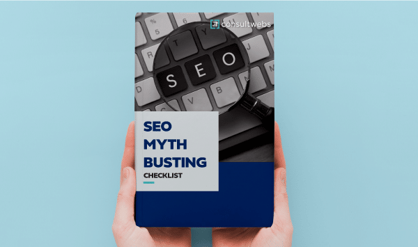 Handheld seo guide debunking myths with highlighted keyboard keys on a light blue background.