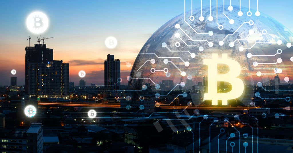 Cityscape with digital overlay of Bitcoin and Ethereum symbols at dusk.